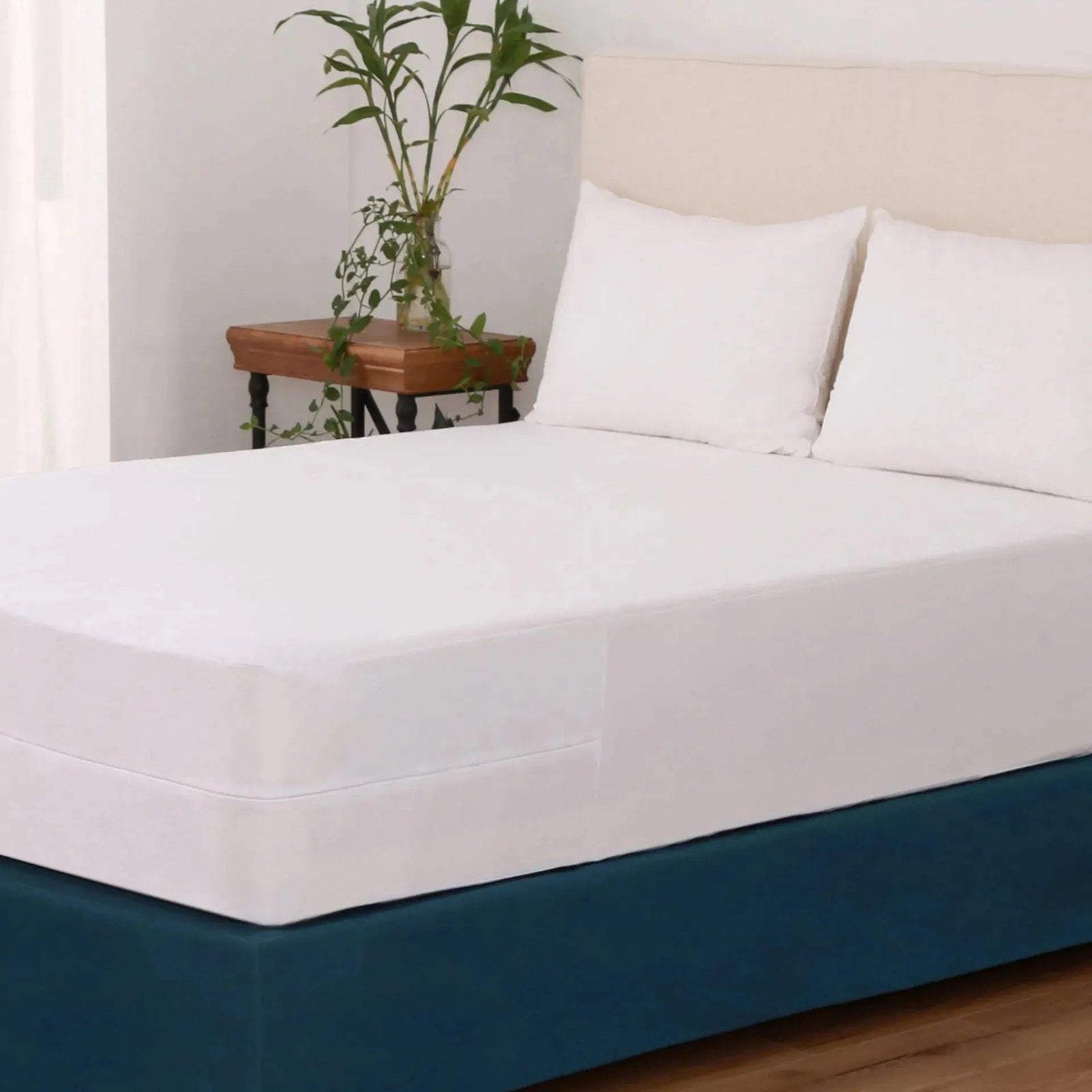 BPT white mattress encasement fitted around a mattress